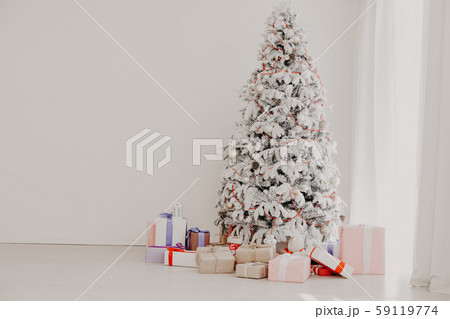 White Christmas tree in Konate with stocking-stuffers White Christmas tree in Konate with stocking-stuffers 59119774