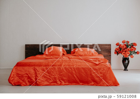 the Interior of the white room with a bed with red the Interior of the white room with a bed with red 59121008