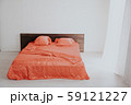the Interior of the white room with a bed with red 59121227