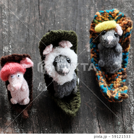Funny scene three cute mice lay down relax on black wooden background Funny scene three cute mice lay down relax on black wooden background 59121533
