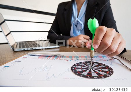 Target  darts board with bull eyes, Reach to business goal with the power of the team 59123456