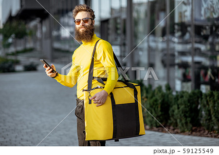 Man delivering food with thermal bag Man delivering food with thermal bag 59125549
