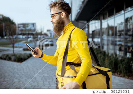 Man delivering food with thermal bag Man delivering food with thermal bag 59125551