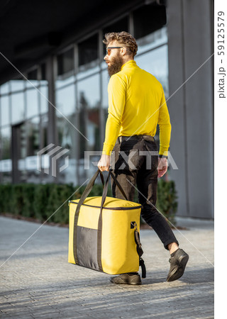 Man delivering food with thermal bag 59125579