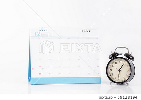Vintage clock and calendar December on white background, time concept 59128194