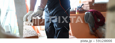 Man installing wall Man installing wall 59128666