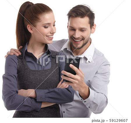 Attractive couple taking a selfie together on Attractive couple taking a selfie together on 59129607