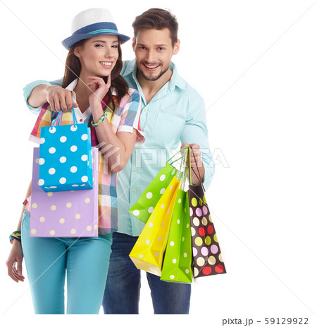 couple with shopping bags couple with shopping bags 59129922