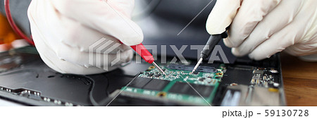 Male hands in white protective glove hold Male hands in white protective glove hold 59130728