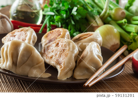 Japanese dumplings - Gyoza with pork meat and Japanese dumplings - Gyoza with pork meat and 59131201