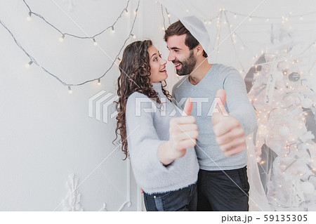 Photo of positive, excited people chilling in nightlife new year party. 59135305