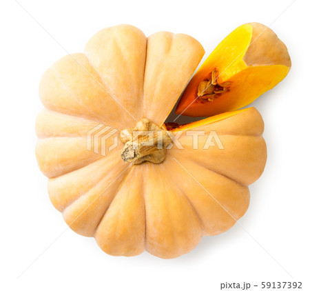 The pumpkin with the cut out piece on a white. The The pumpkin with the cut out piece on a white. The 59137392