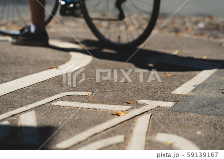 Bike path with stencil on asphalt Bike path with stencil on asphalt 59139167