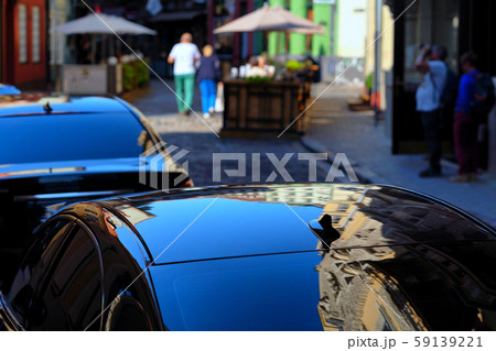 Old Riga with reflections in the roofs of cars Old Riga with reflections in the roofs of cars 59139221