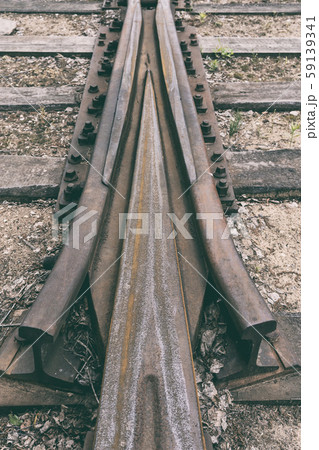 Old wooden sleepers with rails Old wooden sleepers with rails 59139341