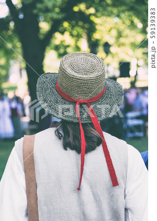 A man in a straw hat on a national holiday 59139383