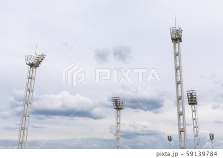 Light posts on cloudy sky background, bottom view. 59139784