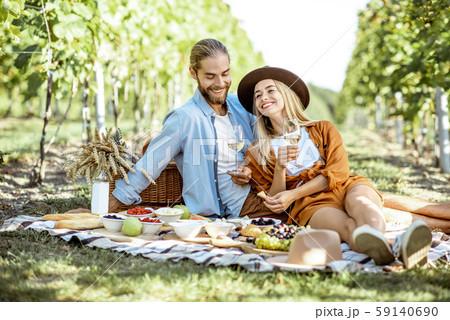 Young couple having a breakfast on the vineyard 59140690