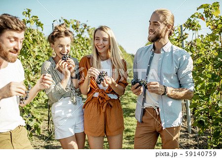Group of young people on the vineyard Group of young people on the vineyard 59140759