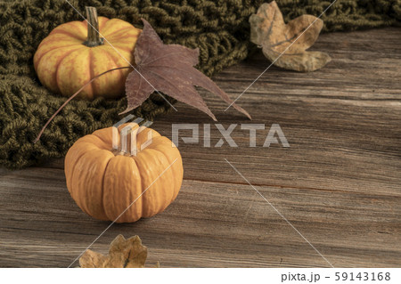 wooden table decorated with pumpkins and dried wooden table decorated with pumpkins and dried 59143168