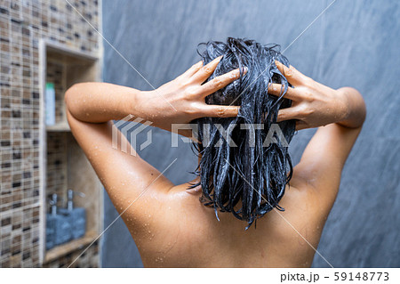 woman shower and wash hair in bathroom woman shower and wash hair in bathroom 59148773