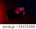 cell phone on dark background 59155088