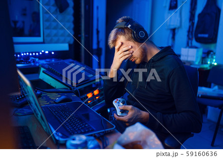Tired gamer, gaming lifestyle, cyber addiction Tired gamer, gaming lifestyle, cyber addiction 59160636
