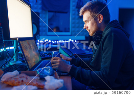 Gamer drinking an energy drink, gaming lifestyle 59160700