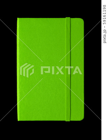Green closed notebook isolated on black Green closed notebook isolated on black 59161198