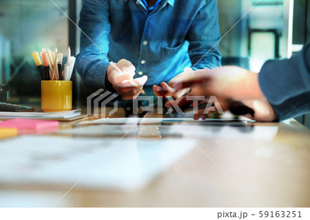 business people have a meeting. businessman working analyzing performance revenue with team. business people have a meeting. businessman working analyzing performance revenue with team. 59163251
