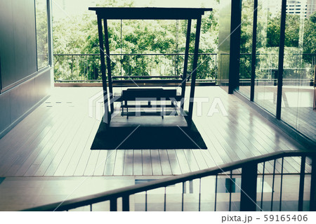 wooden rocking chair bench on terrace patio wooden rocking chair bench on terrace patio 59165406