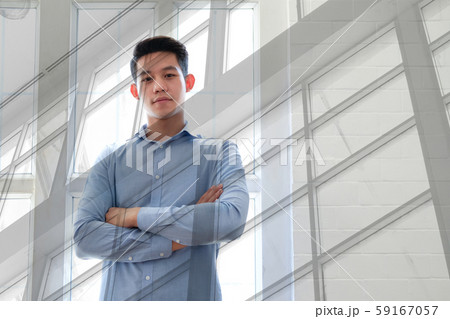 portrait of asian businessman standing at workplace 59167057