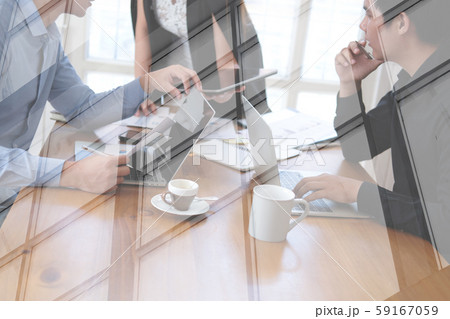 businesswoman analyzing discussing business project with colleague 59167059