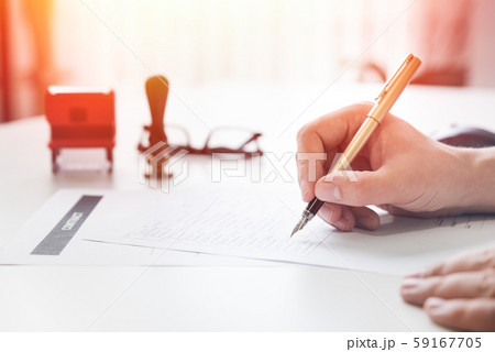 Lawyer working in office. Notary signs document 59167705