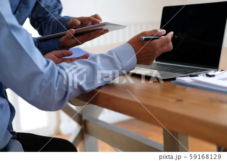 business people have a meeting. businessman working with team using tablet business people have a meeting. businessman working with team using tablet 59168129