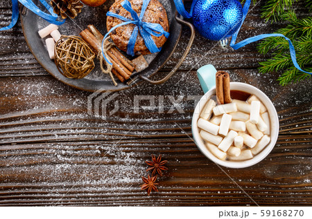 Flat lay Christmas background of blue mug with hot Flat lay Christmas background of blue mug with hot 59168270