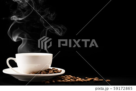 Cup coffee with steam and beans on a black Cup coffee with steam and beans on a black 59172865
