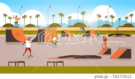 skaters performing tricks in public skate board park with various ramps for skateboarding mix race 59173012