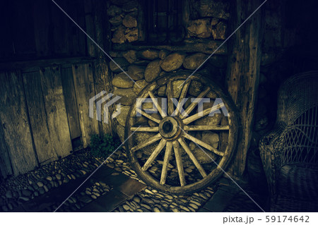 Old wooden carriage wheel Old wooden carriage wheel 59174642