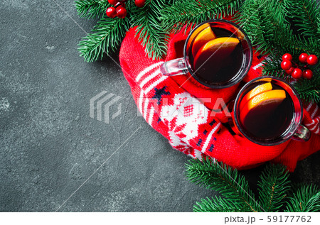 Christmas with mulled wine and a warm scarf. 59177762
