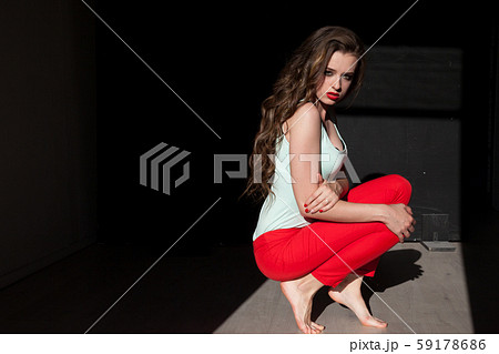 portrait of a beautiful fashionable woman with red lips 59178686