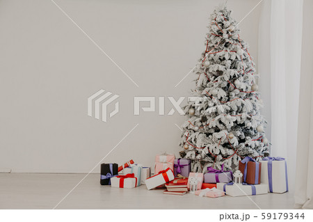 Christmas tree with presents, Garland lights new year Christmas tree with presents, Garland lights new year 59179344