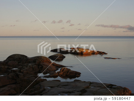 Sunset scene at the shore of Lake Vanern. Sunset scene at the shore of Lake Vanern. 59180447