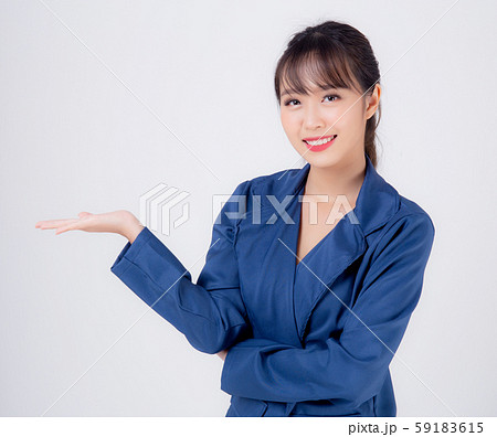 Beautiful portrait young asian business woman presenting and showing with confident 59183615