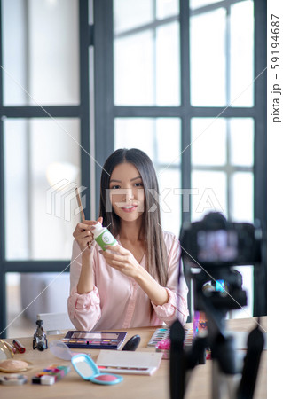 Beauty blogger recommending vitamins for her followers 59194687