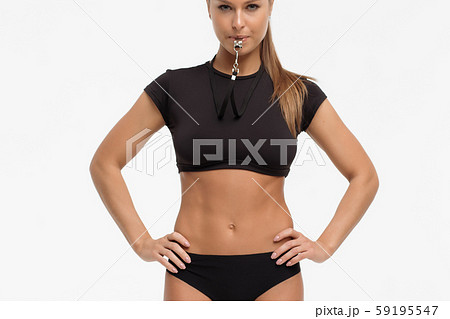 Attractive sensual woman in lingerie with whistle 59195547