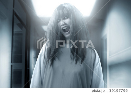 Scary ghost woman with blood and angry face 59197796
