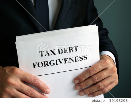 Man holdsTax debt forgiveness agreement. Man holdsTax debt forgiveness agreement. 59198208