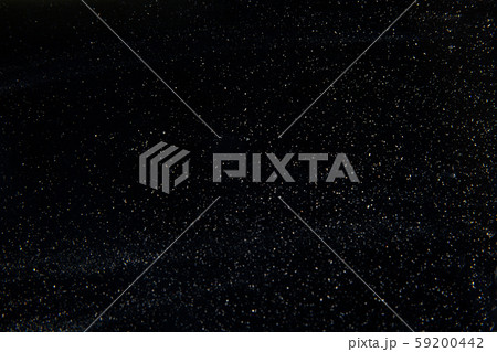 abstract real dust floating over black background for 59200442