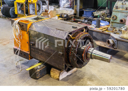 disassembled large electric motor in a repair shop 59201780